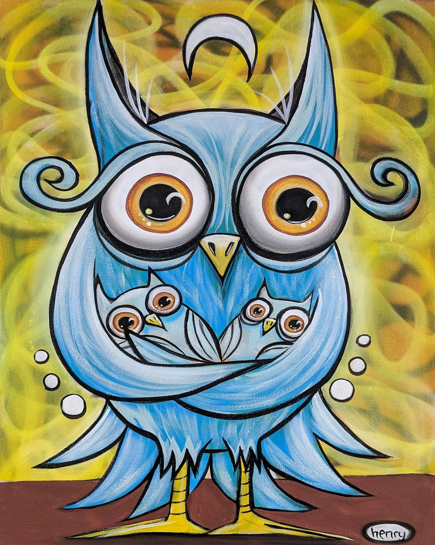 The image is a vibrant and whimsical painting featuring a large blue owl with large, expressive eyes and a distinctive crest, holding two smaller owls in its arms. The background is a mix of yellow and orange hues, creating a warm and energetic atmosphere.